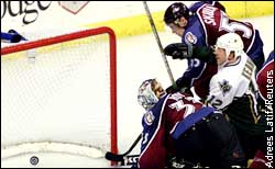 Patrick Roy, Martin Skoula and Mike Keane